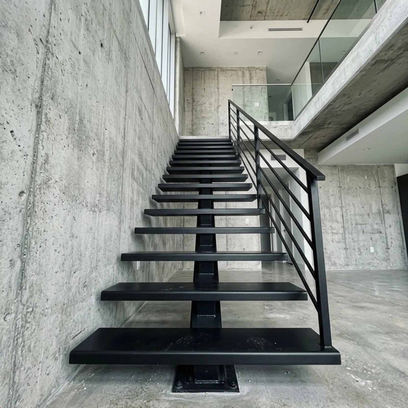 Steel beam floating staircase showing industrial fabrication quality